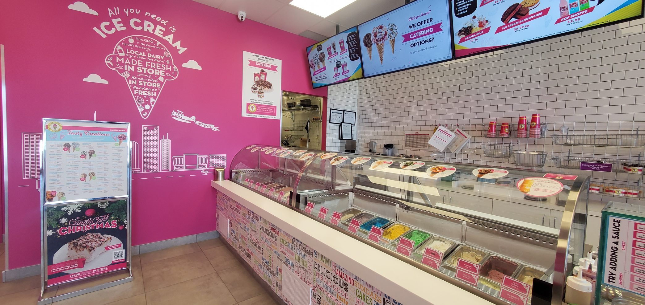 Front service counter of an ice cream shop in Brampton, with counter cabinets and countertop built by Leewood Finishing
